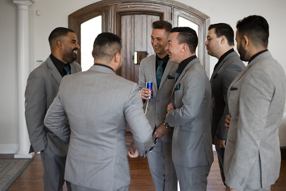 Nashville Nashville wedding photographer photographing the groom and groomsmen at a Nashville wedding 