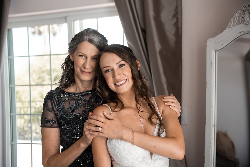 Nashville wedding photographer capturing a romantic portrait of the bride and groom in Nashville, TN.Nashville wedding photographer capturing the bride getting ready on her wedding day in Nashville, TN.