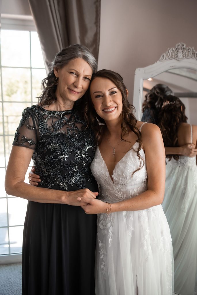 Nashville wedding photographer capturing a romantic portrait of the bride and groom in Nashville, TN.Nashville wedding photographer capturing the bride getting ready on her wedding day in Nashville, TN.