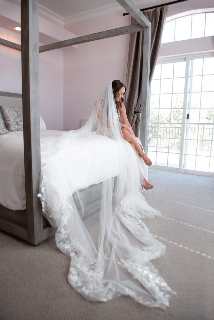 Nashville wedding photographer capturing a romantic portrait of the bride and groom in Nashville, TN.Nashville wedding photographer capturing the bride getting ready on her wedding day in Nashville, TN.