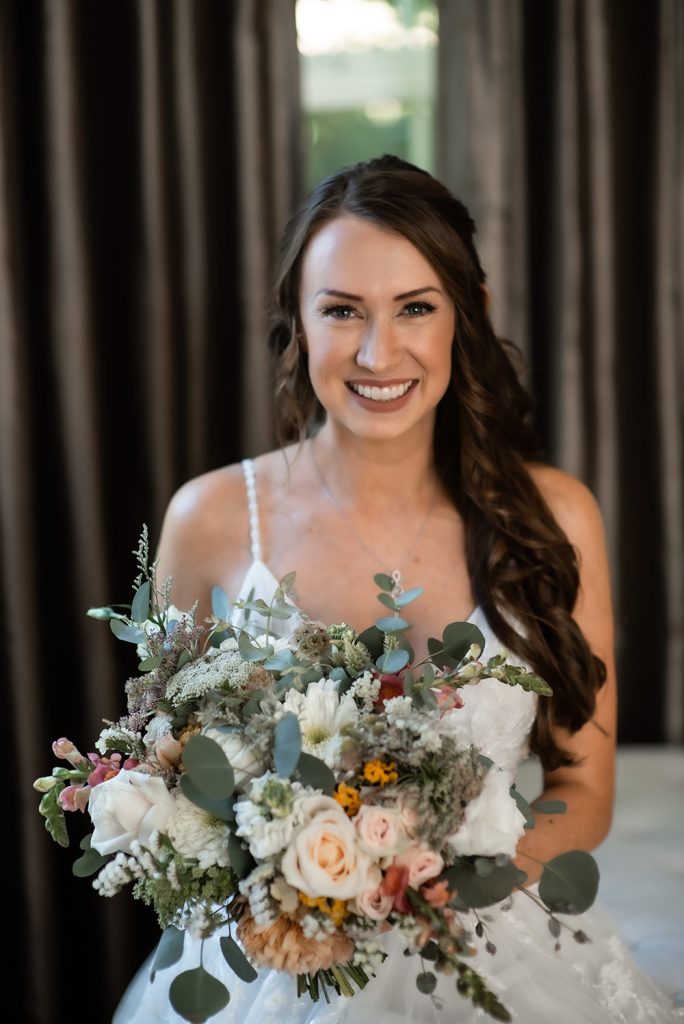 Nashville wedding photographer capturing a romantic portrait of the bride and groom in Nashville, TN.Nashville wedding photographer capturing the bride getting ready on her wedding day in Nashville, TN.