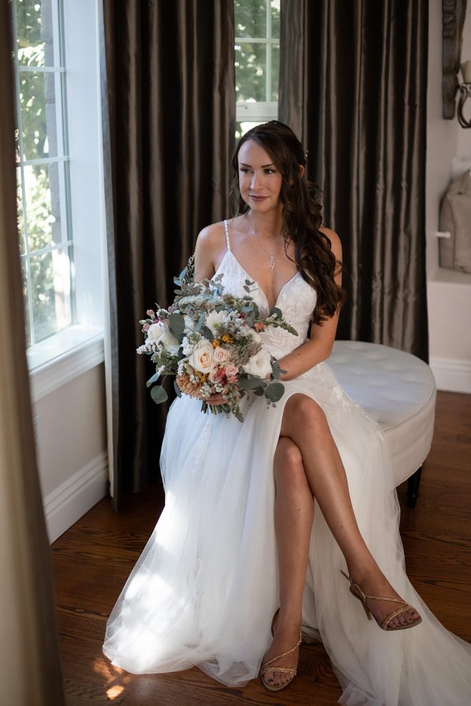 Nashville wedding photographer capturing a romantic portrait of the bride and groom in Nashville, TN.Nashville wedding photographer capturing the bride getting ready on her wedding day in Nashville, TN.