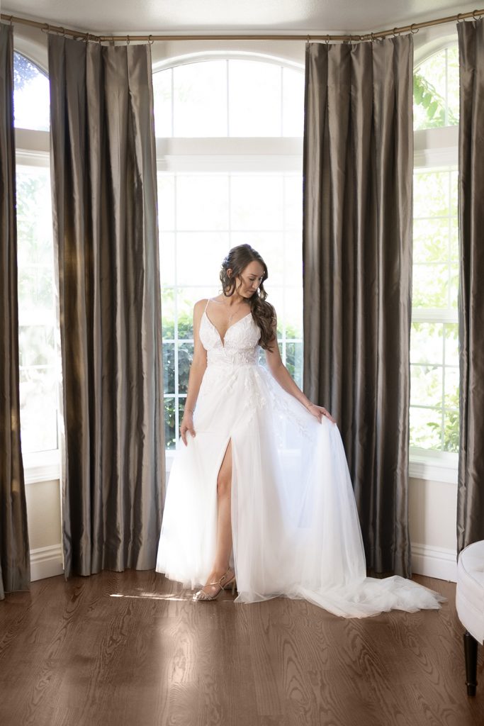 Nashville wedding photographer capturing a romantic portrait of the bride and groom in Nashville, TN.Nashville wedding photographer capturing the bride getting ready on her wedding day in Nashville, TN.