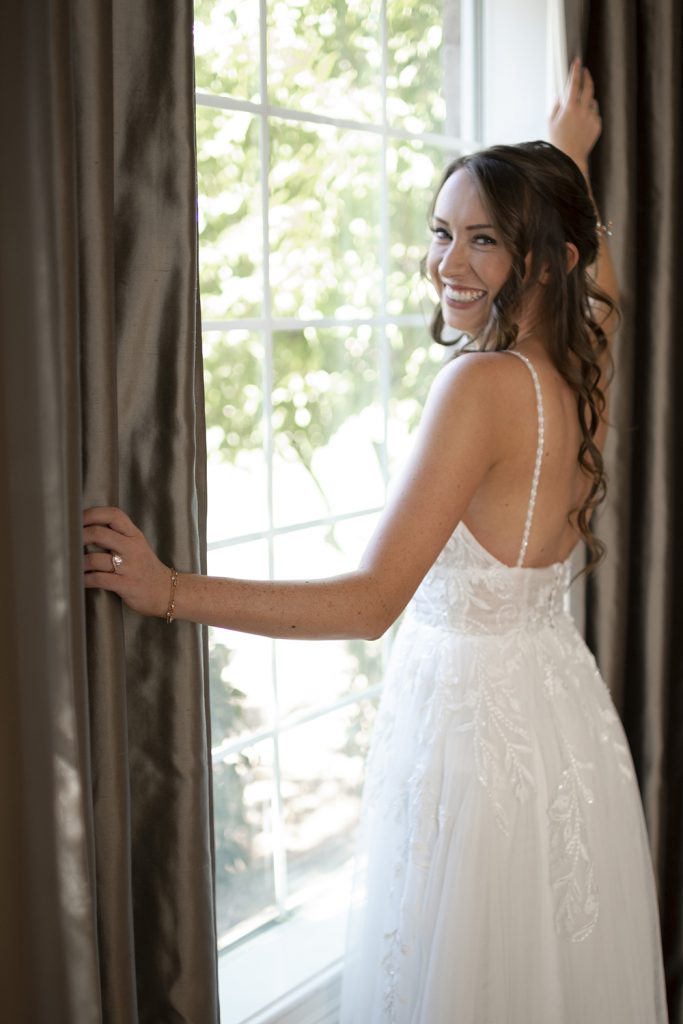 Nashville wedding photographer capturing a romantic portrait of the bride and groom in Nashville, TN.Nashville wedding photographer capturing the bride getting ready on her wedding day in Nashville, TN.