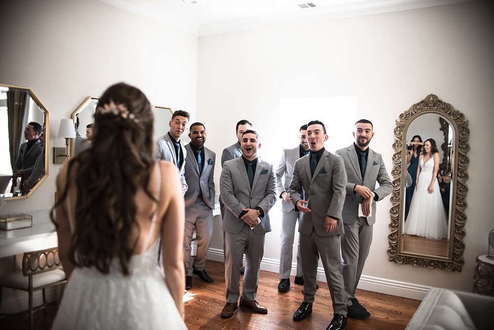 Nashville wedding photographer capturing a romantic portrait of the bride and groom in Nashville, TN.Nashville wedding photographer capturing the bride getting ready on her wedding day in Nashville, TN.