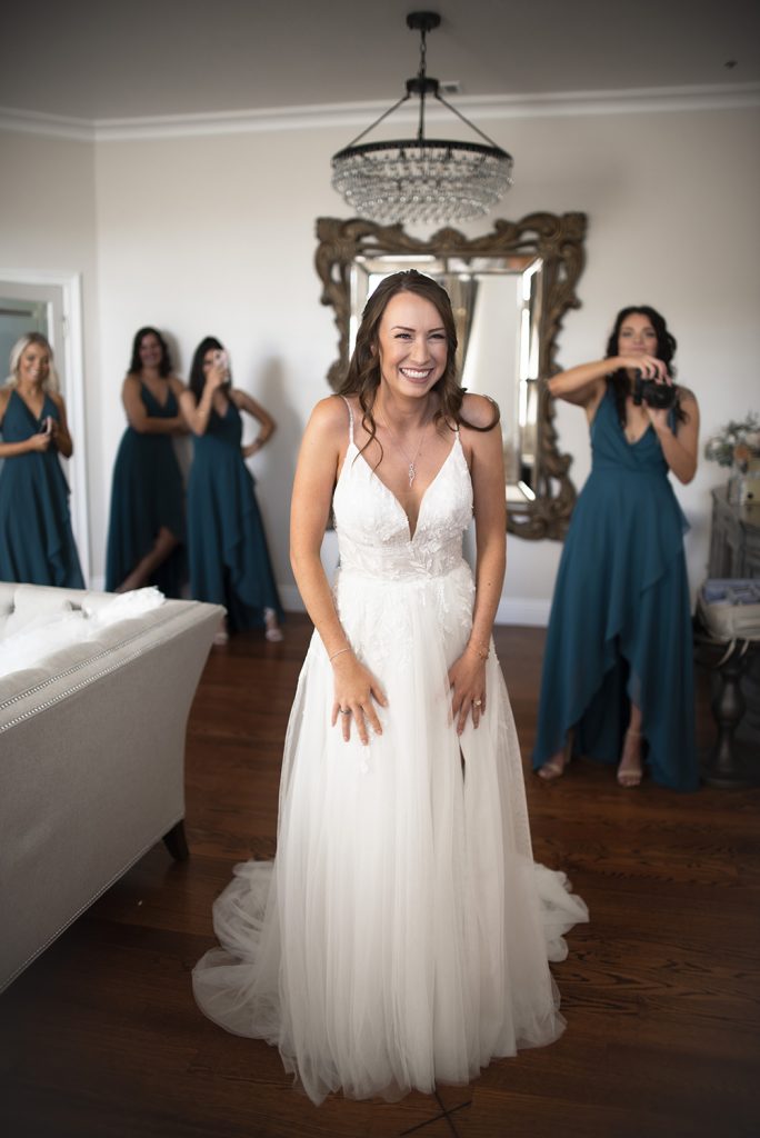 Nashville wedding photographer capturing a romantic portrait of the bride and groom in Nashville, TN.Nashville wedding photographer capturing the bride getting ready on her wedding day in Nashville, TN.