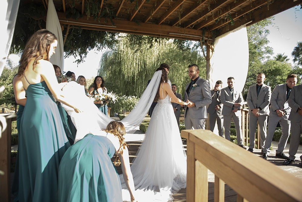 Nashville wedding photographer capturing a romantic portrait of the bride and groom in Nashville, TN. Nashville wedding photographer documenting an elegant wedding ceremony at a Nashville venue. 