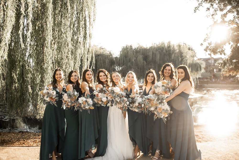 Nashville wedding photographer. Nashville wedding photographer capturing a fun moment with the bridal party in Nashville, TN.