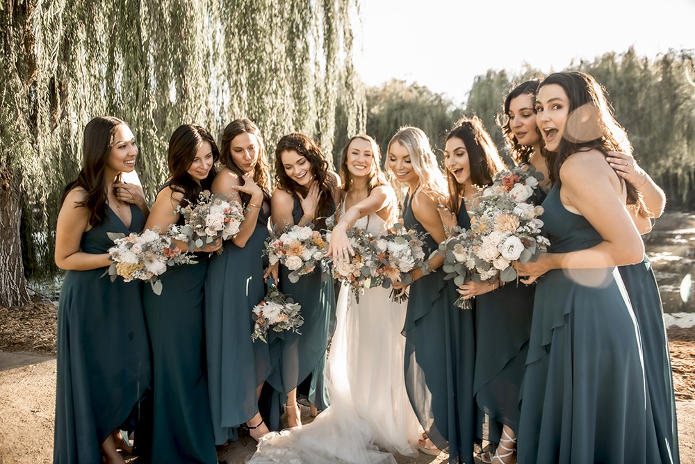 Nashville wedding photographer.Nashville wedding photographer capturing a fun moment with the bridal party in Nashville, TN.