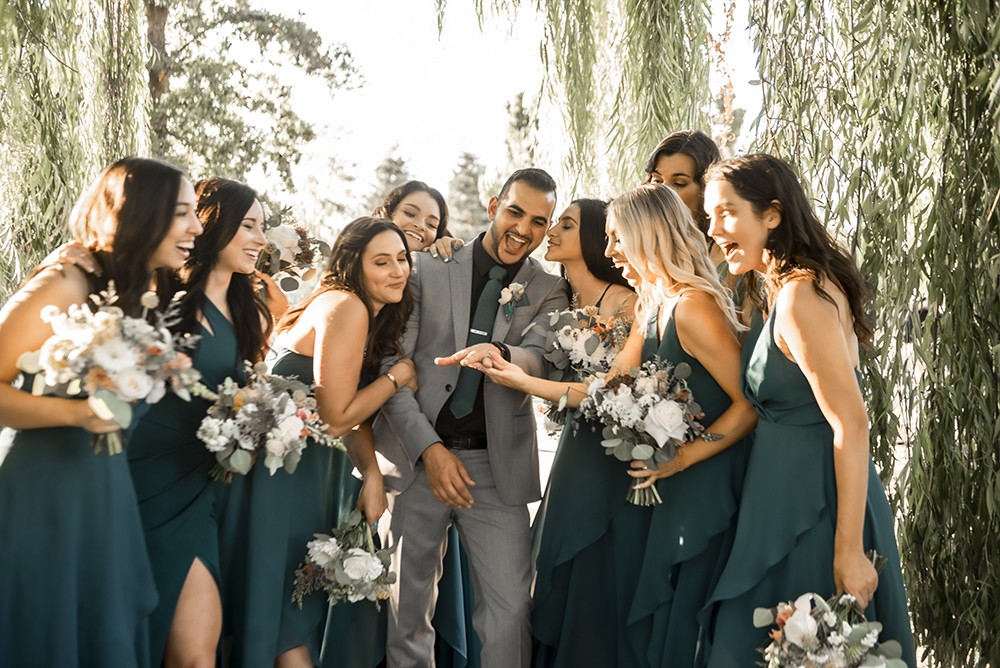 Nashville wedding photographer.Nashville wedding photographer capturing a fun moment with the bridal party in Nashville, TN.