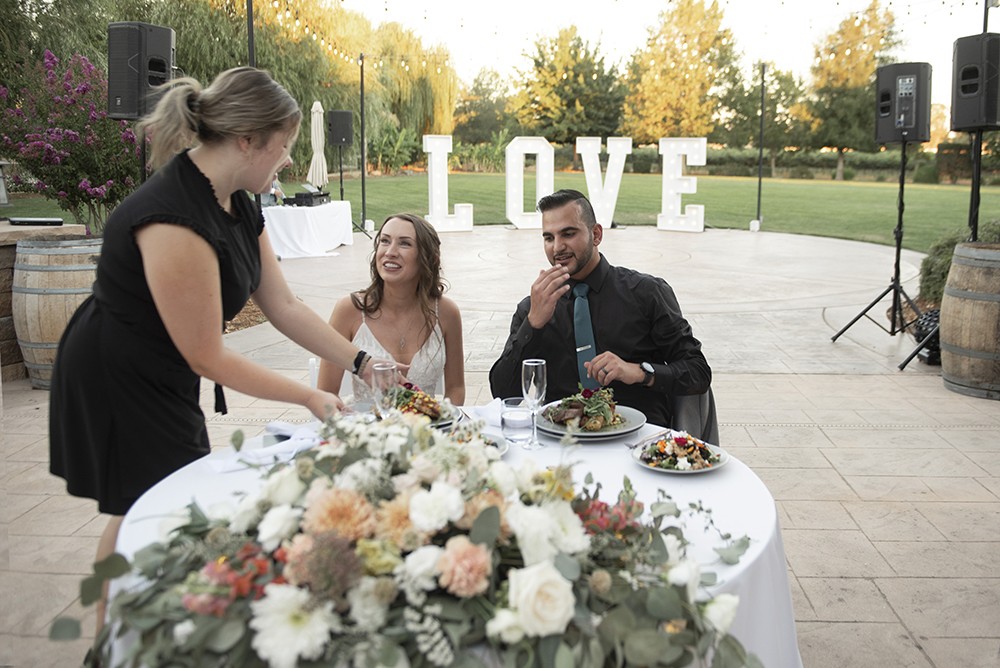 Nashville wedding photographer capturing candid moments at the wedding reception in Nashville, TN.