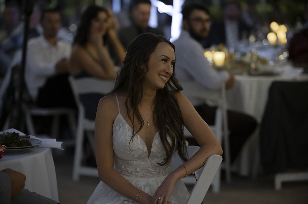 Nashville wedding photographer capturing candid moments at the wedding reception in Nashville, TN.