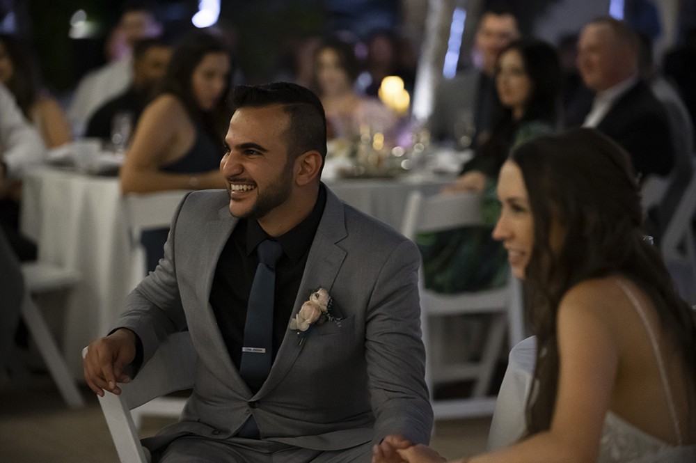 Nashville wedding photographer.Nashville wedding photographer capturing candid moments at the wedding reception in Nashville, TN.