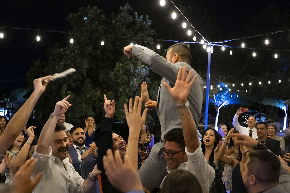 Nashville wedding photographer.Nashville wedding photographer capturing candid moments at the wedding reception in Nashville, TN.