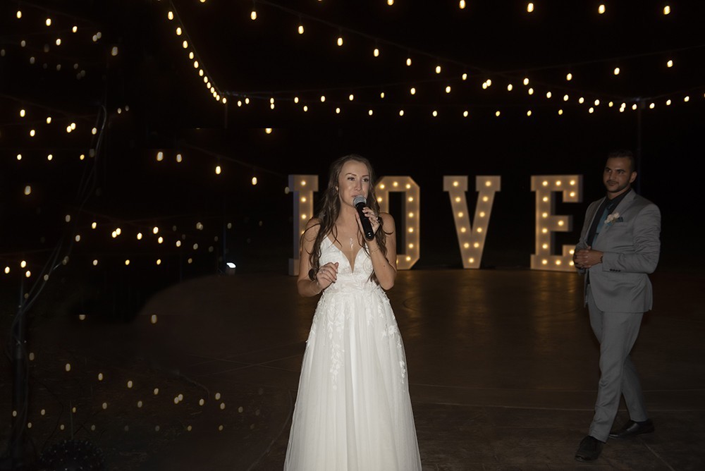 Nashville wedding photographer.Nashville wedding photographer capturing candid moments at the wedding reception in Nashville, TN.