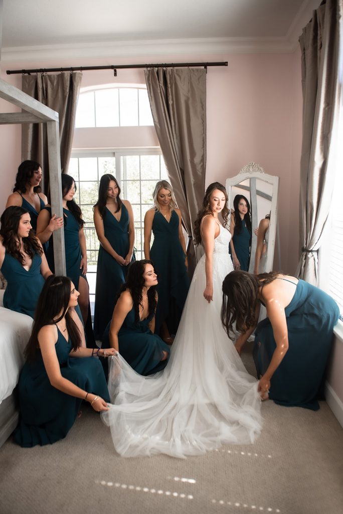 Nashville wedding photographer capturing a romantic portrait of the bride and groom in Nashville, TN.Nashville wedding photographer capturing the bride getting ready on her wedding day in Nashville, TN.