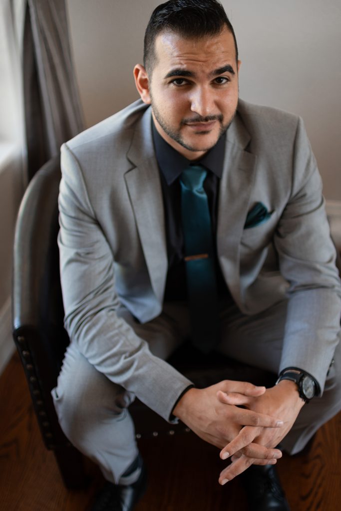 Nashville wedding photographer photographing the groom and groomsmen at a Nashville wedding 