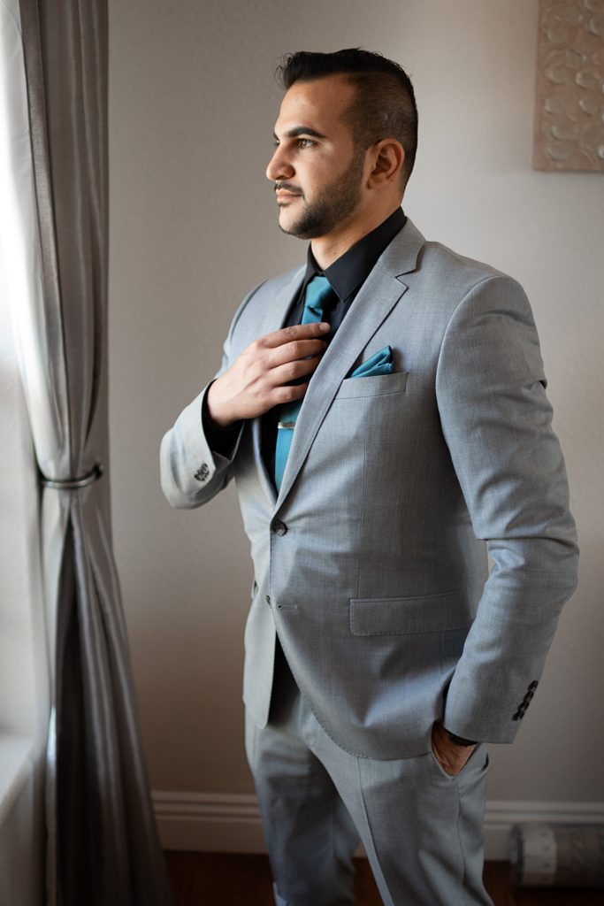 Nashville wedding photographer photographing the groom and groomsmen at a Nashville wedding 