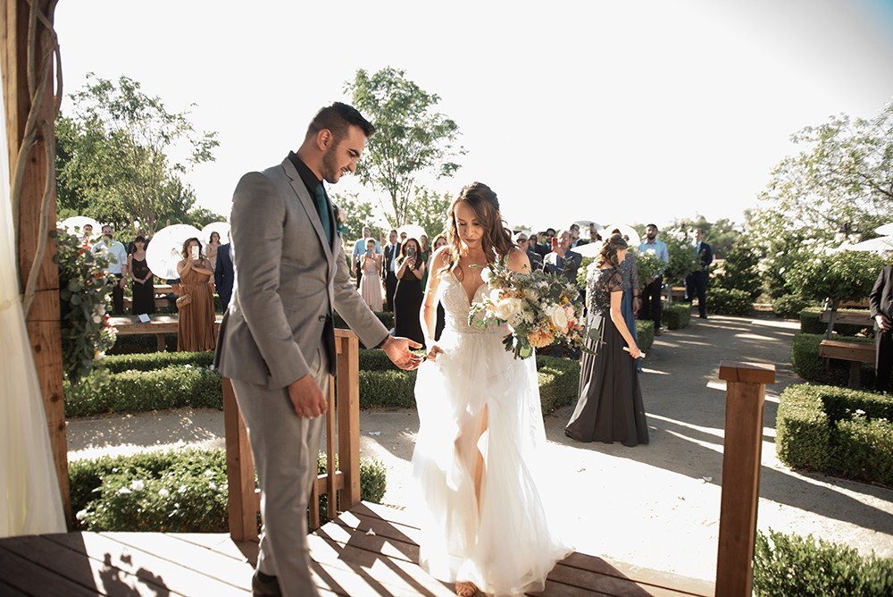 Nashville wedding photographer capturing a romantic portrait of the bride and groom in Nashville, TN. Nashville wedding photographer documenting an elegant wedding ceremony at a Nashville venue. 
