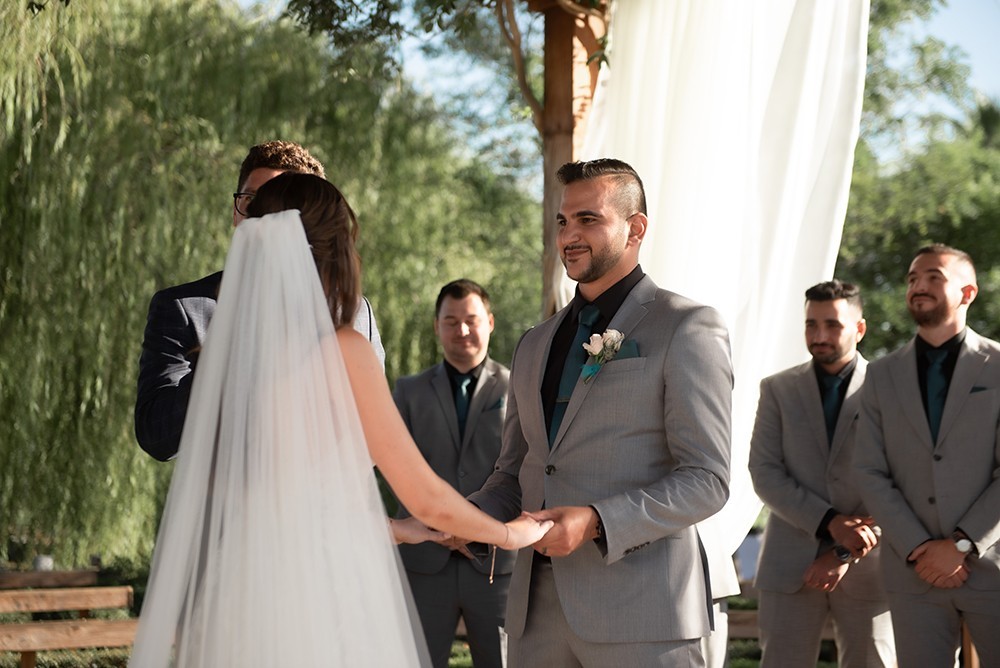 Nashville wedding photographer capturing a romantic portrait of the bride and groom in Nashville, TN. Nashville wedding photographer documenting an elegant wedding ceremony at a Nashville venue. 