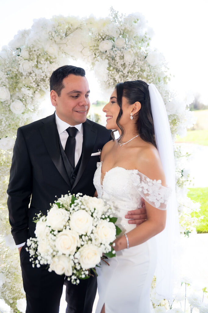 Bride laughing during vows