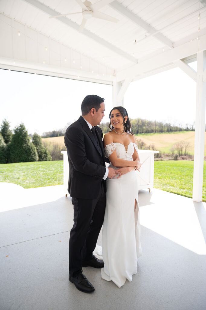 Intimate first dance under string lights