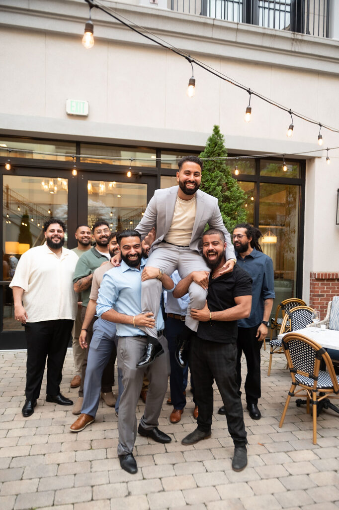 Joyful reactions from family members during proposal surprise